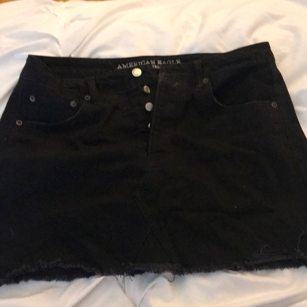 Mini black denim skirt